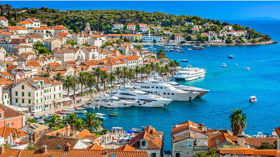 Croatian city with shoreline and yachts